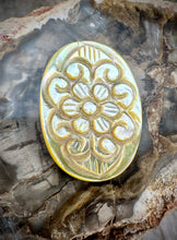 carved mother of pearl pendant